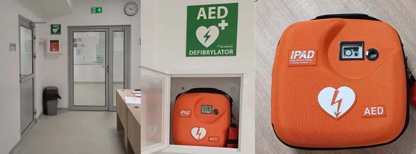 Zdjecie przedstawia otwartą torbę z urzadzeniem AED, defibrylator na ścianie i umieszczenie skrzynki z AED na ścianie przy portierni